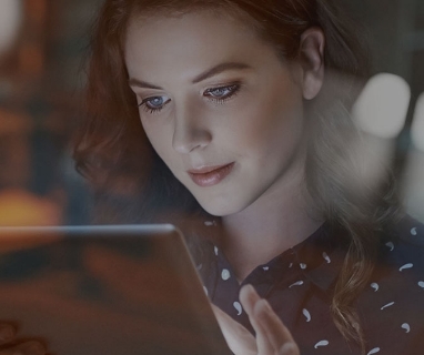Close-up of woman using a touch screen
